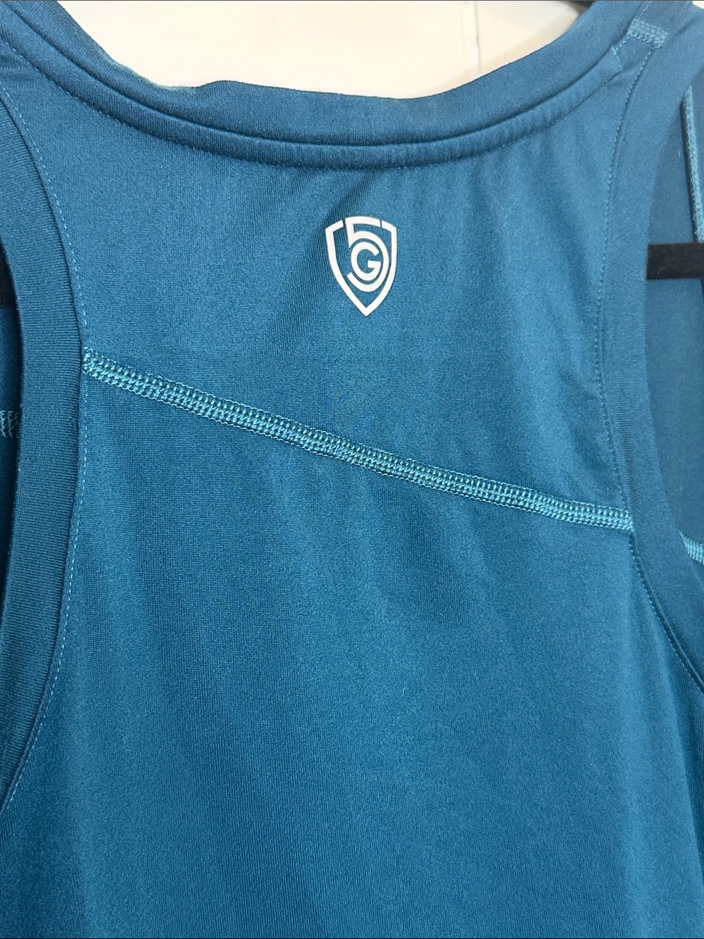 Women’s Advance Teal Sleeveless Performance Tank Top - Picture 5 of 7